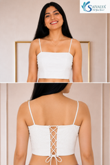 Two-panel vertical image showing the front and back views of a woman wearing a white textured inner crop top from the Amaya Mauve Textured Shorts Set; the top panel features a smiling medium front view highlighting the straight neckline and thin spaghetti straps, while the bottom panel shows a close-up back view highlighting the lace-up criss-cross tie detailing at the back.