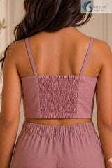 Close-up back view of a mauve pink crop top highlighting the stretchy smocked back panel and spaghetti straps from the Rose Bloom set.