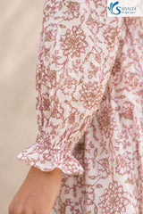 Close-up sleeve detail of Bloom & Breezy Peplum Co-ord Set featuring pink floral print, gathered cuff sleeves and soft cotton ethnic wear fabric design by Saivalya.