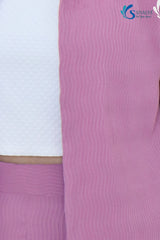 Extreme close up shot of the Saivalya Amaya mauve textured shorts set highlighting the unique wavy ribbed fabric pattern and high quality material finish