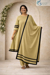 Front view of a woman wearing the Saivalya Olive Zenith Scalloped Suit Set featuring black border details on the dupatta and sleeves with a scalloped hemline paired with matching trousers