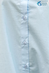 close view of Saivalya's powder blue organic cotton sleeveless tunic fabric with a high-low hem and mandarin collar.